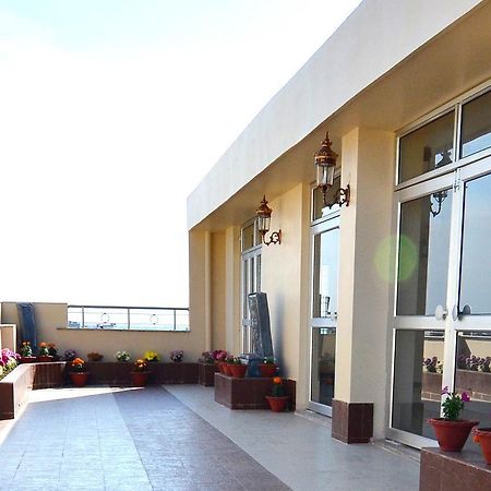 Tulip Residency Hotel Дибругар Екстериор снимка