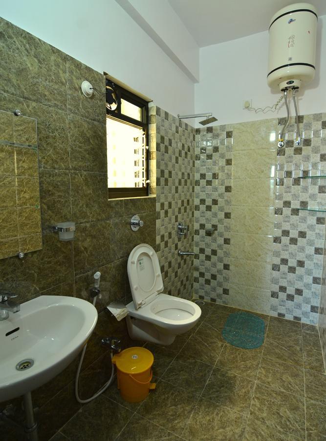 Tulip Residency Hotel Дибругар Екстериор снимка
